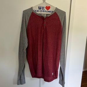 Long sleeved Henley shirt. In great condition